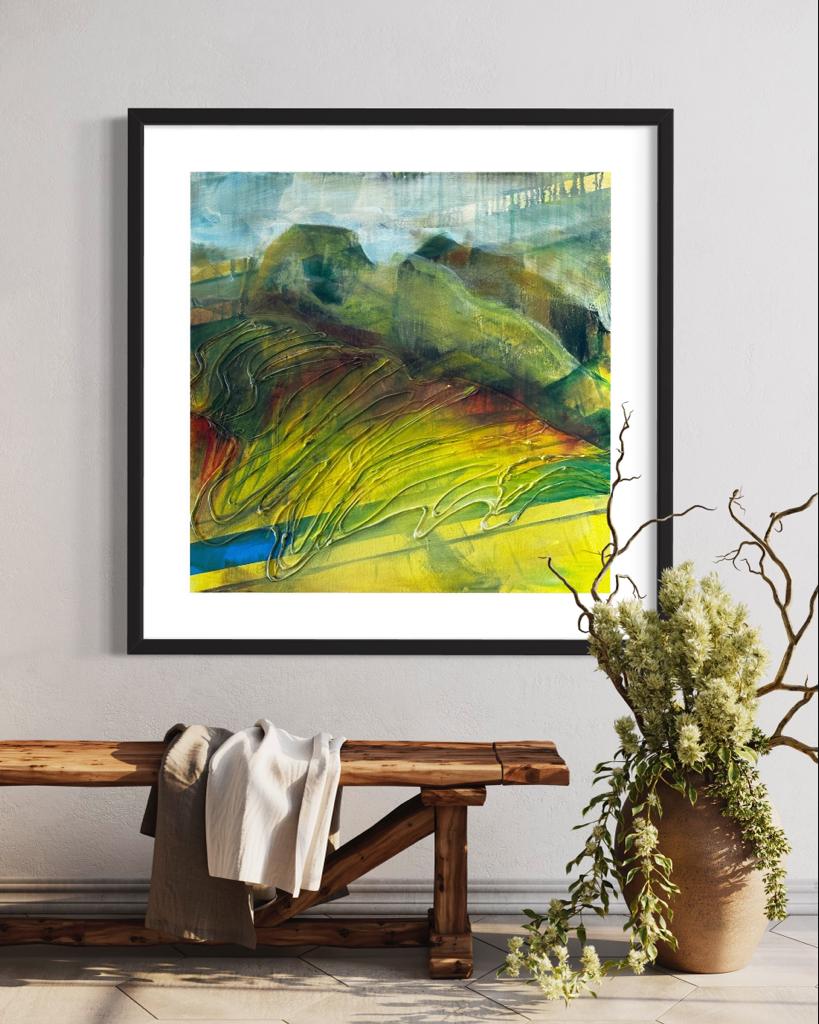 This image shows a painting of green hills.